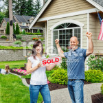 stock-photo-22913909-happy-family-with-sold-home